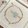 Xigu H0177 Pulsera de Mariposa Dorada de Plata S925 Completa Retro Francés Lujo Accesible Joyería de Mano de Nicho de Gama Alta para Mujeres