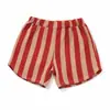 26 Novos Estilos de Verão para Crianças: Blusas Pulôver Japonesas e Coreanas de Manga Curta com Gola Redonda, Calças Listradas Estampadas Infantis e Bermudas Esportivas