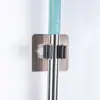 Pegamento fuerte clip para mopa sin perforaciones súper resistente estante para mopa pegatina sin costuras colgador de mopa estante de almacenamiento para escoba recogedor de polvo