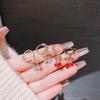 Aretes de cereza de diseño japonés y coreano 2024 aretes de diseño red nuevo aretes temperamento aretes de lujo ligero al por mayor