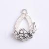 Nuevo colgante de imitación de diamante ojo de gato gota de agua roja Accesorios para el cabello hechos a mano DIY Pulsera Accesorios de aleación en stock