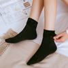 Calcetines cálidos de otoño e invierno para adultos, calcetines cálidos de color sólido de moda para hombres y mujeres, además de calcetines de nieve acolchados de terciopelo