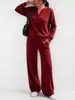 2026 Roupa feminina transfronteiriça europeia e americana outono e inverno nova moda top solto de manga comprida e calça de perna larga conjunto casual esportivo de duas peças