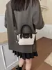Bolso pequeño de alta gama para mujer, nuevo estilo 2026, bolso de mano casual simple, bolso para ir al trabajo, moderno y versátil, de un solo hombro, bolso cruzado