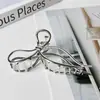 Pinza para el pelo de lazo de metal, diseño de nicho, pinza de tiburón grande para la parte trasera de la cabeza, estilo minimalista, sensación de alta gama, no daña el pelo, modelo de otoño e invierno