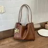 Bolsa de Alta Qualidade Transfronteiriça Feminina Verão 2026 Nova Bolsa de Ombro Único Grande Capacidade Moda Trabalho Retro Bolsa Tote