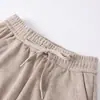 Nova Coleção Outono/Inverno 2026: Calças casuais quentes e confortáveis com forro de fleece para mulheres de meia-idade e idosas, apresentando um design slim fit e um comprimento que valoriza a silhueta.