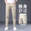 Marca Francesa de Alta Gama Jeans Blancos para Hombre Corte Slim Fit Cónico Elásticos Transpirables Versátiles Pantalones de Primavera Nuevos a Prueba de Tres