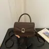 Bolsa Feminina 2026 Outono Nova Simples Moda Pequena Quadrada de Mão Bolsa de Ombro Moda Retrô Bolsa Transversal Casual