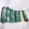Venta al por mayor de prismas hexagonales de cristal natural del Mar de China Oriental, gemas multienergéticas, artesanías de cristal transfronterizas, columna de cristal de piedra original