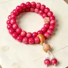 Pulseira de bodhi rosa popular no TikTok para mulheres, acessório cultural de mão com laço duplo estilo chinês, pulseira de contas de sementes de bodhi atacado