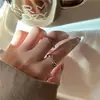 Anel Gota de Luxo Leve para Mulheres Design Simples de Nicho Senso de Estilo Frio Anel de Dedo Cruzado Personalizado Abertura Ajustável