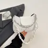 Bolsas populares de nicho de varios años para mujer otoño 2026 nuevo estilo bolso cruzado texturizado bolso de mano bolso de hombro único para debajo del brazo