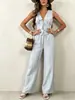 Conjunto de dos piezas estilo resort hecho a medida: Top sin mangas con cuello en V y cintura de corbata combinado con pantalones anchos fluidos