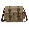En stock al por mayor estilo retro europeo y americano lona con cuero de caballo loco bolso de hombro para hombre bolso mensajero unisex versátil para todo tipo de outfits