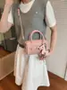 Bolsa Pequena de Mão com Padrão Lichia Simples Primavera Verão Feminina 2026 Nova Moda Bolsa Transversal Couro Macio de Alta Qualidade Bolsa Almofada