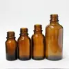 Botella de vidrio marrón de fábrica para aceite esencial botella de embalaje de aceite esencial cosmético 30ml botella de depuración para trasvase al por menor en stock