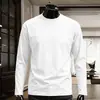 Camiseta casual versátil de manga larga para hombre para otoño, cuello redondo, camiseta básica de color liso de moda, cómoda, transpirable, top de corte holgado