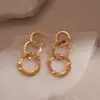 Pendientes de Borla Redonda Metálicos Plegados Aguja de Plata Lujo Ligero Pendientes de Gama Alta Diseño Transfronterizo Europeo y Americano Nicho
