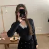 Otoño e Invierno Nuevo Dulce Elegante Cuello en V Lazo de Encaje Reductor de Edad Cubre Carne Jersey de Punto de Manga Larga Ropa de Punto para Mujer