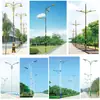 Proyecto prepago para nuevas áreas rurales: Farolas solares de doble cabeza con brazo alto y bajo, postes de farola de 6,8 m y 10 m
