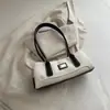 Bolso de Hombro Retro de Nicho Francés para Mujer 2026 Otoño Nuevo Bolso de Bowling Simple de Moda Portátil para el Viaje Diario
