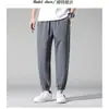 Calças Bloomers de Seda Gelada para o Verão de 2024 Calças Nove Pontos Masculinas Novas Calças Esportivas de Cor Sólida Calças Casuais Soltas Emagrecedoras
