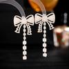 Europeu e americano retro corte estilo brincos leve moda de luxo elegante brincos de zircão longo tassel brincos de laço atacado