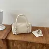 Bolso de Mano de Cuero Suave Retro de Nicho Almohada de Mano para Mujer Otoño Simple Versátil Lujo Ligero Viaje Diario Bolso de Hombro Cruzado