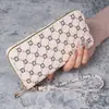 Nova carteira feminina transfronteiriça 2024 Bolsa de embreagem longa Impressão de moda europeia e americana Bolsa para celular Carteira Bolsa de moedas