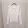 Diseño Coreano Versátil de Alto Nivel, Moda Adelgazante, Lazo Rojo, Hueco, Nuevo Top para Mujer Primavera Temprana 2026