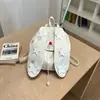 Mochila fofa com orelhas de coelho transfronteiriça, estilo college doce, grande capacidade, mochila casual versátil para o dia a dia para mulheres