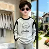 Camiseta de manga larga de algodón puro para niños, primavera y otoño, cómoda y transpirable, top de capa base para niños mayores, camisa de estilo raglán moderna y genial