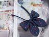 Punto al por mayor corbata de lazo orejas de conejo femenina jacquard de seda de poliéster más dura estilo académico collar de corbata JK flor selección de diez colores