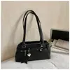 Bolsa de Ombro Retro de Alto Acabamento para Mulheres, Novo Modelo Primavera 2026, Bolsa de Ombro Casual de Grande Capacidade, Bolsa Baguete Nicho para o Dia a Dia