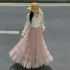 Falda de pastel de malla con empalme en capas con sentido del diseño, nuevo estilo de otoño para mujer, falda midi esponjosa, falda de princesa de hadas