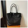 Bolso tote tejido para mujer 2026 nuevo de moda versión coreana retro gran capacidad bolso de hombro simple para el trabajo versátil