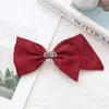 Nuevo Pasador de Pelo con Lazo Pequeño Asimétrico Estilo Chanel Clip Superior Elegante de Perla Clip de Resorte para la Parte Trasera de la Cabeza para Mujeres