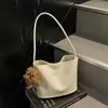 Bolsa de Ombro Versátil de Luxo Nicho Feminina 2026 Novo Estilo Coreano Moda Retrô para o Dia a Dia Bolsa Tote com Textura Trançada Feminina