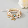 Pulsera de corazón de palma y ojo maligno estilo bohemio, bestseller transfronterizo, pulsera de cordón elástico multicapa