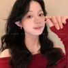 Novos Brincos de Cabide Vermelhos Estilo Chinês 2025 Novo Modelo High-End Light Luxury Retro Brincos de Tarraxa Versáteis e Elegantes Acessórios de Orelha