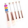 Ventas directas de fábrica venta caliente DIY con cuentas juego de brochas de maquillaje profesionales de 5 piezas con mango de metal corrector sombra de ojos brocha para cejas cabeza magnética de cambio libre juego de brochas de maquillaje con cuentas hechas a mano