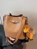 2025 Nuevo Bolso de Hombro de Otoño Bolso Retro Gran Capacidad Versátil Bolso de Hombro Cruzado Bolso Cubo Simple de Moda