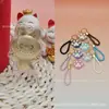 Péndulo de oro nuevo Labubu de oro puro 999, serie de pata de gato aterciopelada, cordón, artículo popular en transmisiones en vivo de Douyin