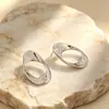 Brincos de argola circulares vazados de metal transfronteiriços europeus e americanos para mulheres, estilo simples, nicho, luxo leve, sensação de alta qualidade, brincos ovais de liga de zinco
