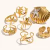 Joia Criativa Estilo Férias Oceânicas Transfronteiriças Europeia e Americana Anel Casual de Aço Inoxidável Banhado a Ouro 18K Estrela do Mar Concha para Mulheres