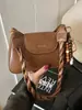 Otoño e Invierno 2025 Diseño de Nicho Color Contrastante Nuevo Bolso de Moda para Mujer Estilo Retro Bolso de Axila Bolso Personalizado de Hombro en Forma de Media Luna