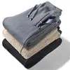 Pantalones para hombre con forro polar Pantalones deportivos gruesos para hombre Otoño e invierno Cálidos Pantalones deportivos de forro polar de cordero Sueltos Talla grande Pantalones casuales