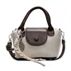2025 Nova Bolsa de Ombro Estilosa Retro de Cores Contrastantes Bolsa Dumpling Versátil para Roupas de Trabalho Diário Casual Transversal Bolsa Feminina