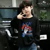 Camiseta de algodón puro estilo coreano para niños, nueva, de manga larga, linda, versátil, cuello redondo, con estampado de dibujos animados, top moderno y elegante